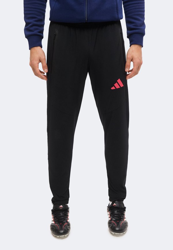 adidas Performance TIRO TRAVEL PANTS - Tracksuit bottoms - black/power pink