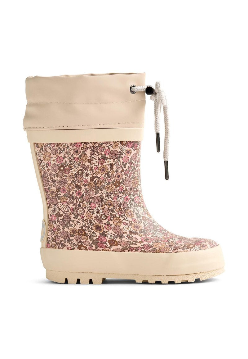 Gummistiefel mit Blumenmuster, beigem Gummischaft, cremefarbenem Umschlag und profilierter Sohle für besseren Halt und Langlebigkeit.