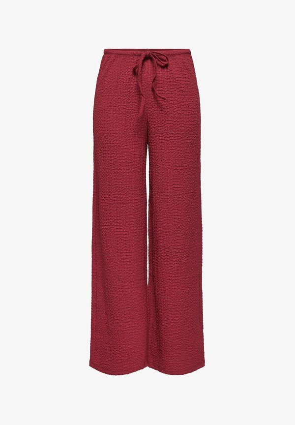 ONLY WIDE-LEG TROUSERS ONLERIKKA WIDE LEG FIT WIDE-LEG TROUSERS - Trousers - brick red