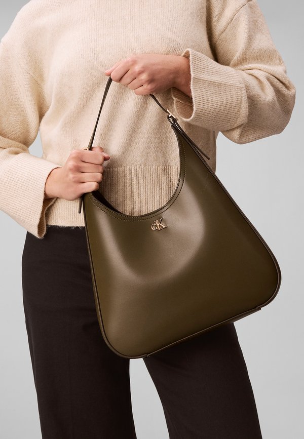 Calvin Klein CK MEDIUM SHOULDER BAG - Handbag - olive night