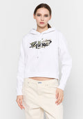 Weißer cropped Hoodie aus weichem Material, mit einem schwarzen und grünen Blumendesign auf der Vorderseite sowie einer Kordelzugkapuze.