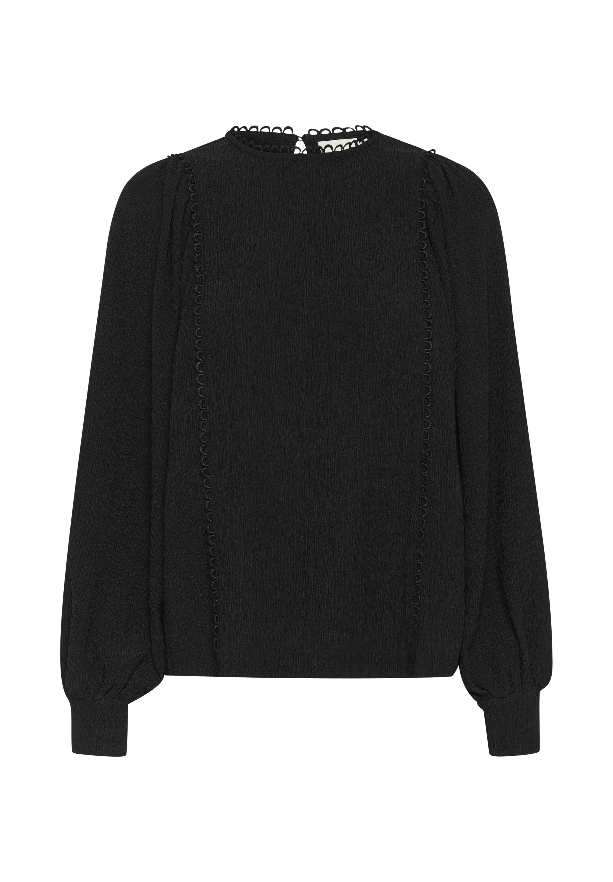 Schwarze Bluse aus strukturiertem Stoff, mit rundem Ausschnitt und langen Puffärmeln. Verfügt über dekorative Stickerei entlang der vorderen Nähte.