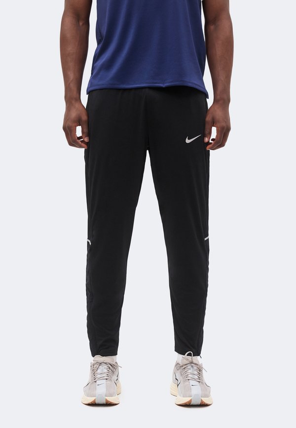 Nike Performance MILER - Tracksuit bottoms - black