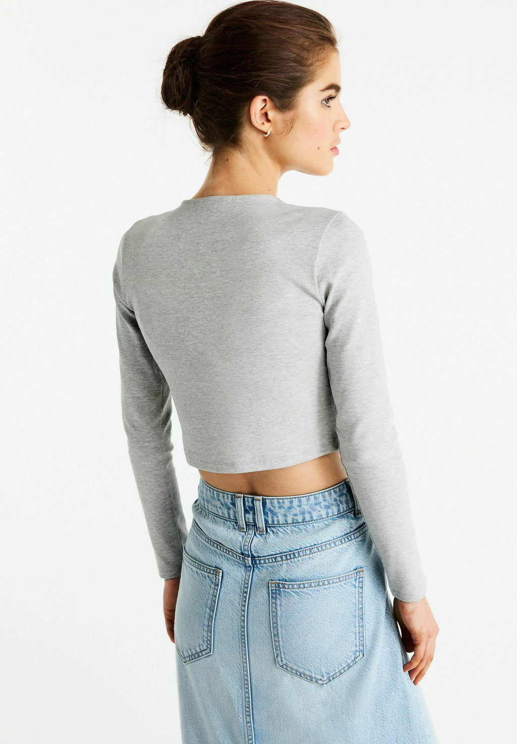Next   CREW NECK