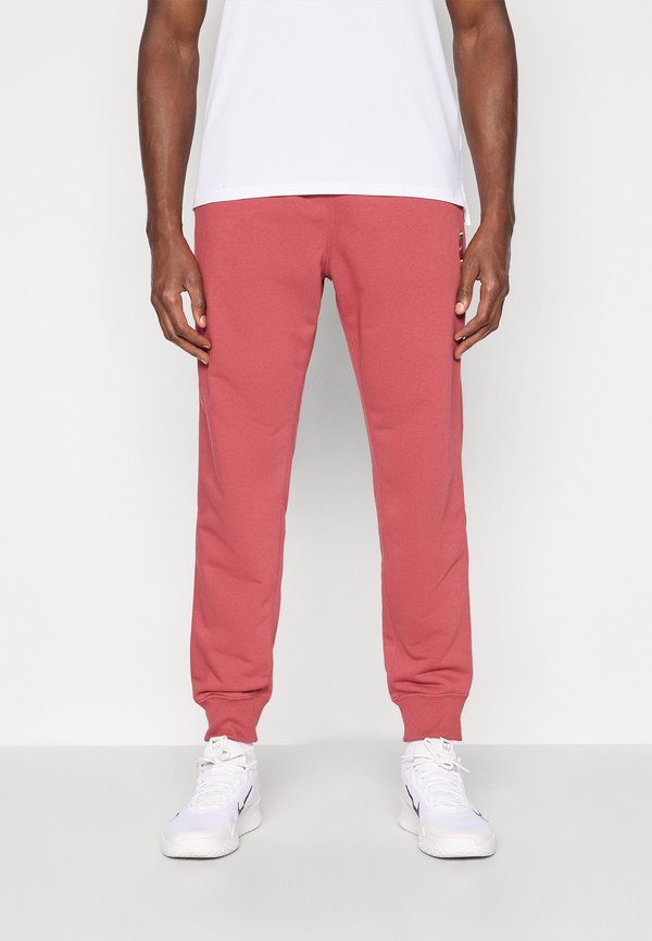 Nike Performance NIKECOURT HERITAGE PANT JOGGER - Tracksuit bottoms - cedar