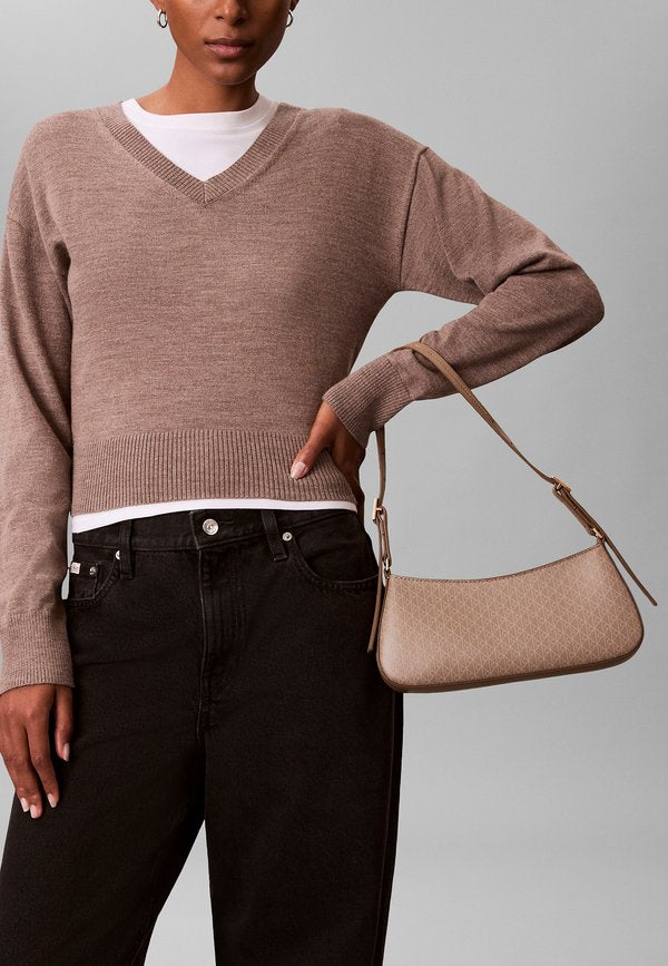 Calvin Klein EMBLEM SMALL SHOULDER - Handbag - desert taupe aop