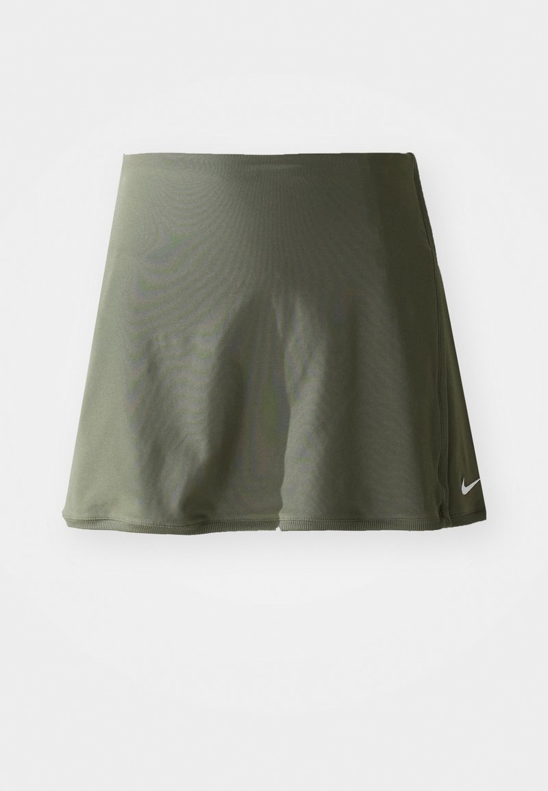 Olivengrüner Sportrock aus glattem, elastischem Material, mit einem breiten Bund und einem kleinen Nike-Logo in der unteren rechten Ecke.