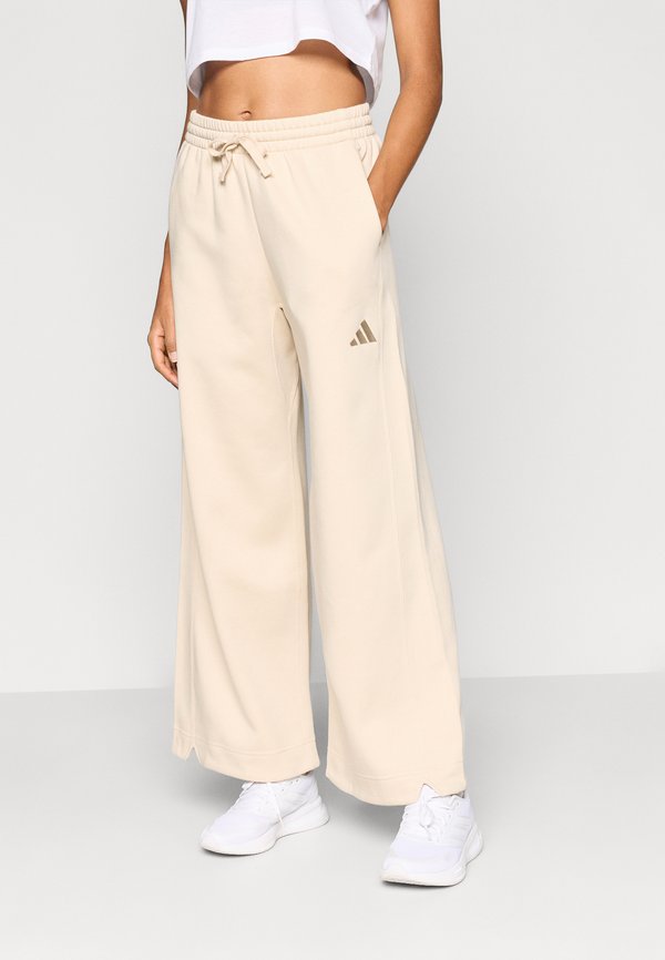 adidas Sportswear ALL SZN FLEECE LOOSE WIDE LEG - Tracksuit bottoms - crystal linen