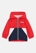 Rote, weiße und marineblaue, mit Kapuze ausgestattete Kinderjacke mit Frontreißverschluss und elastischen Bündchen, mit Timberland-Logo auf der Brust.