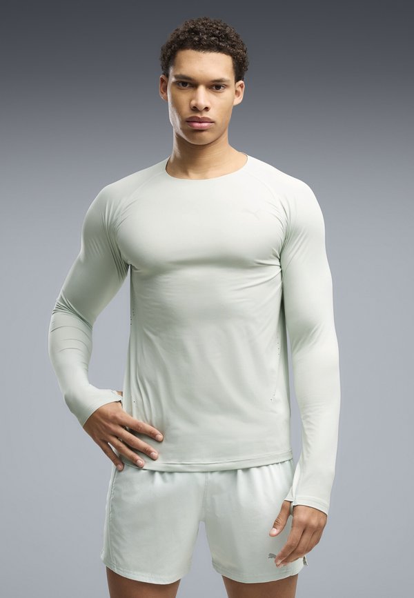 Puma CLOUDSPUN LANGARM-LAUFSHIRT - Long sleeved top - créme de mint