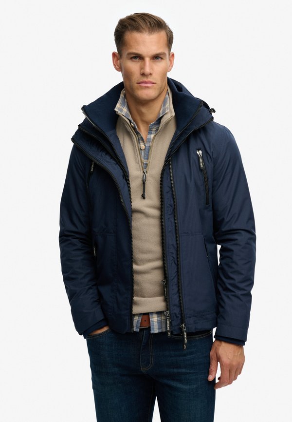 Superdry & Co HOODED MOUNTAIN WINDBREAKER  - Light jacket - richest navy
