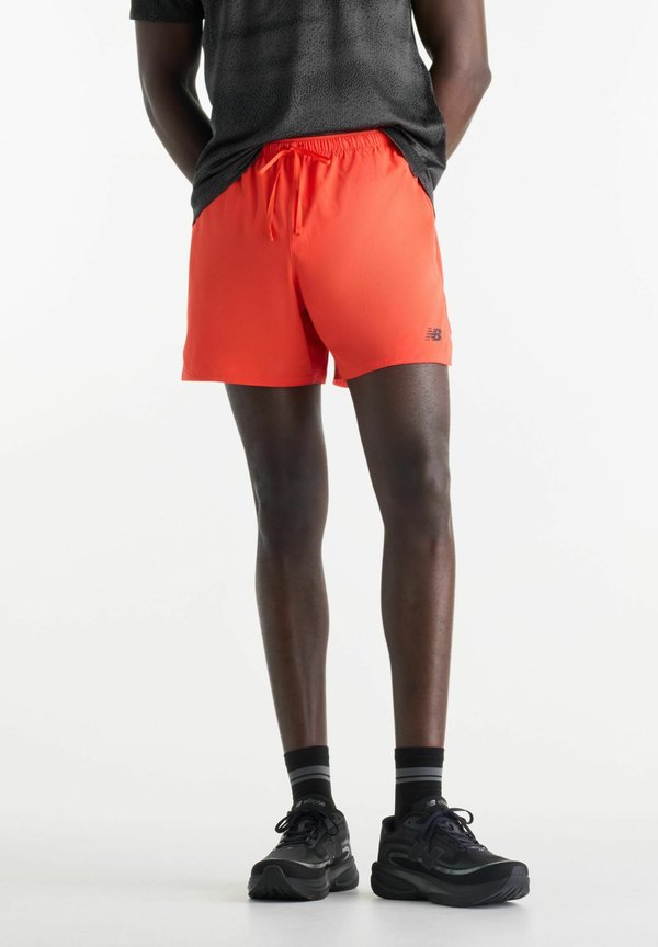 New Balance RC ESSENTIAL SHORT 5" - Sports shorts - neo flame