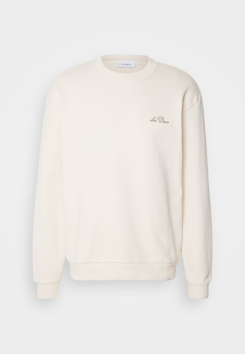 Cremefarbiges Sweatshirt mit Rundhalsausschnitt, gerippten Bündchen und Saum. Verfügt über ein kleines gesticktes Logo auf der linken Brust. Weicher Stoff.