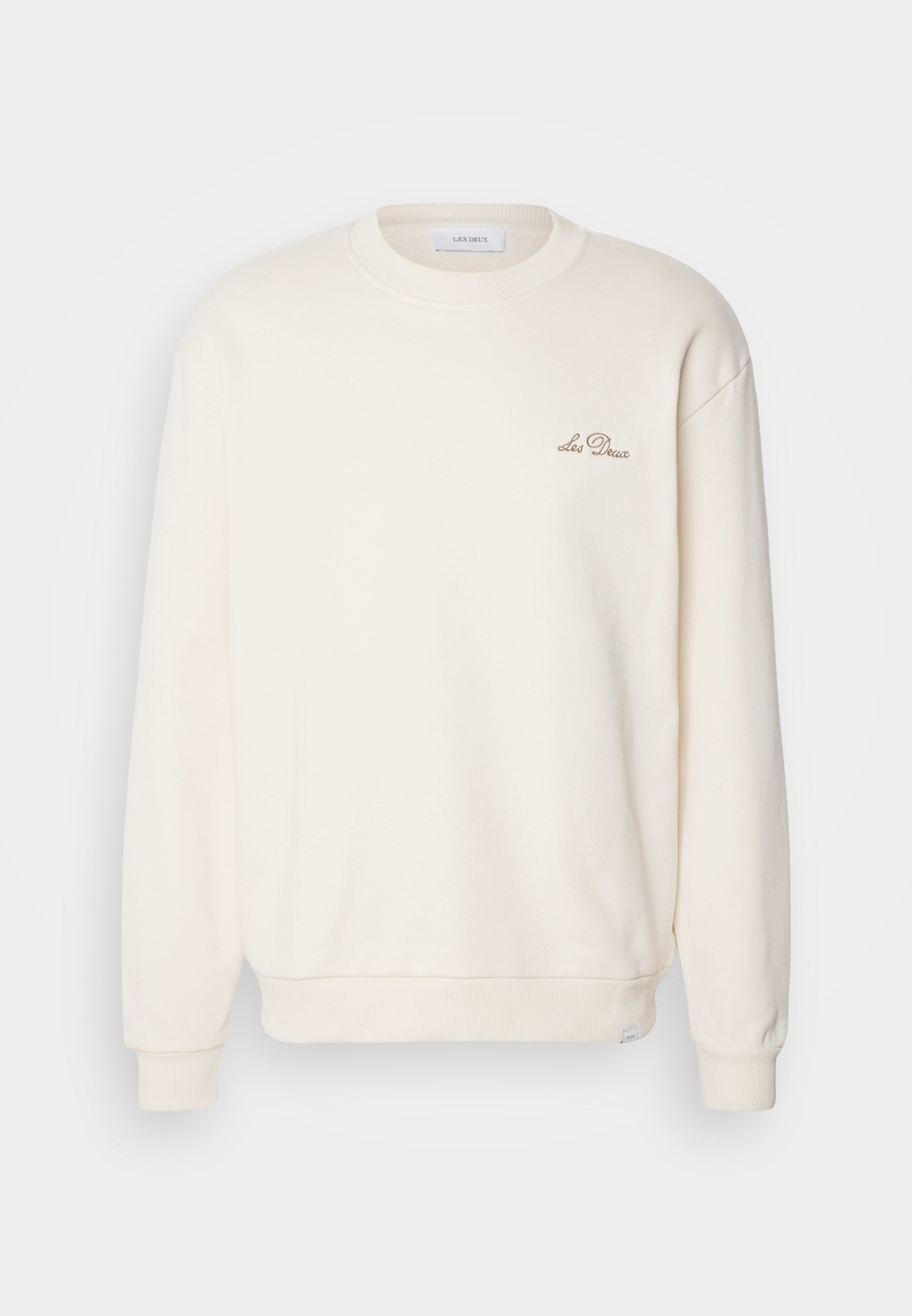 Cremefarbiges Sweatshirt mit Rundhalsausschnitt, gerippten Bündchen und Saum. Verfügt über ein kleines gesticktes Logo auf der linken Brust. Weicher Stoff.