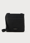 Calvin Klein EMBOSSED WOVEN FLATPACK - Cross body bag - black