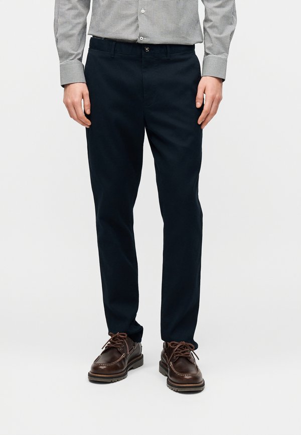 Tommy Hilfiger BLEECKER OPEN STRUCTURE SEASONAL QUALITY - Trousers - desert sky