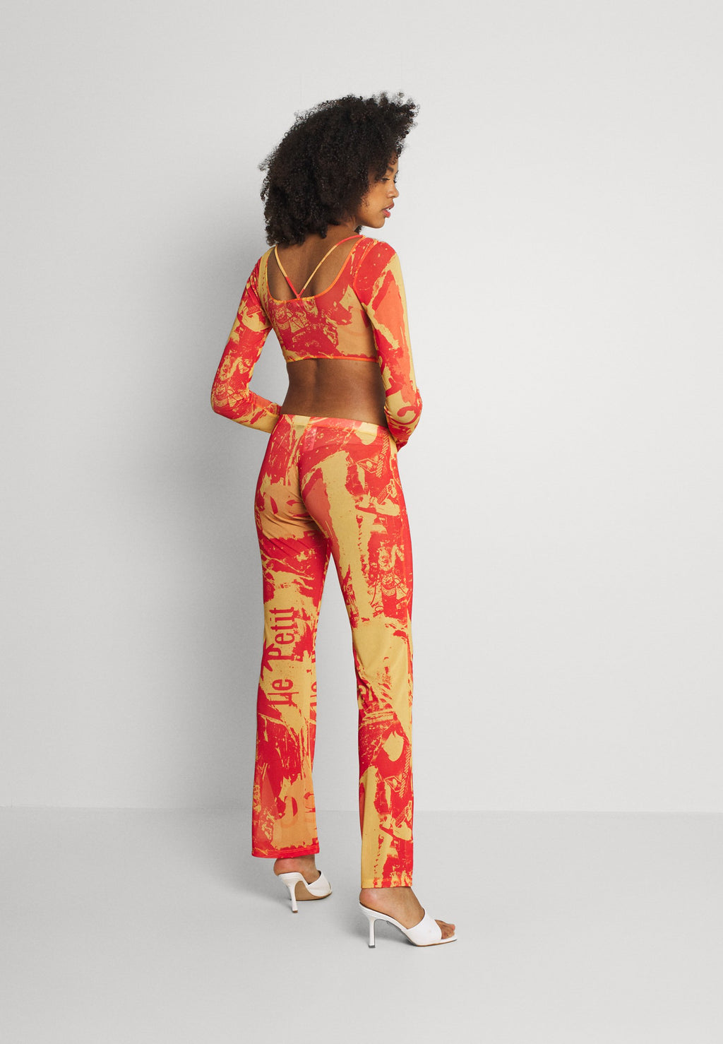 Jaded London BOOTCUT TROUSER TONAL MAGAZINE PRINT