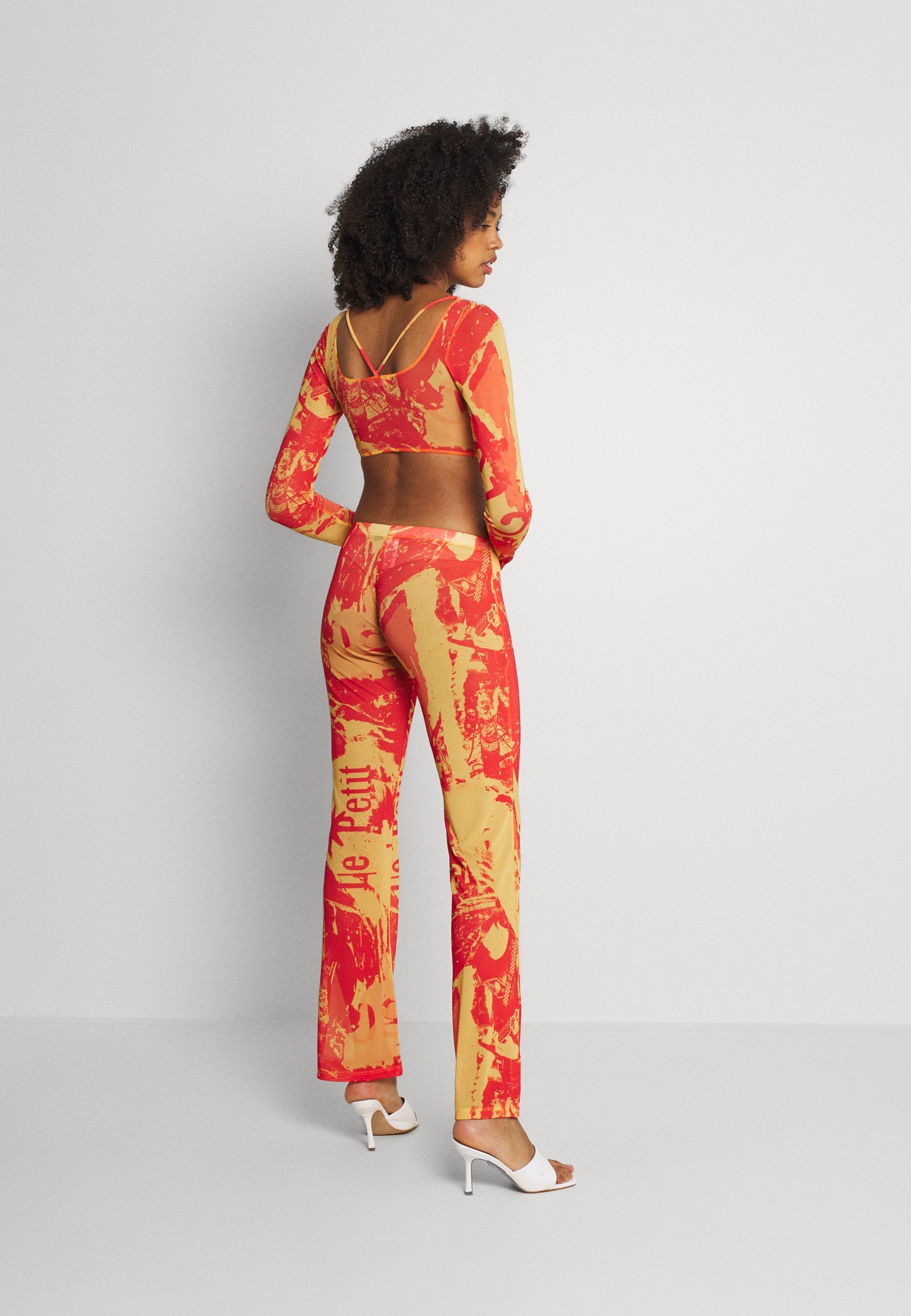Jaded London BOOTCUT TROUSER TONAL MAGAZINE PRINT