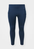 Dunkelblaue Leggings mit hohem Bund, aus dehnbarem Material. Verfügt über seitliche Taschen und dezentes Branding am Bund.