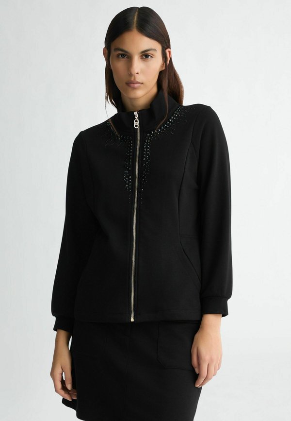 LIU JO WITH ZIP AND RHINESTONES
