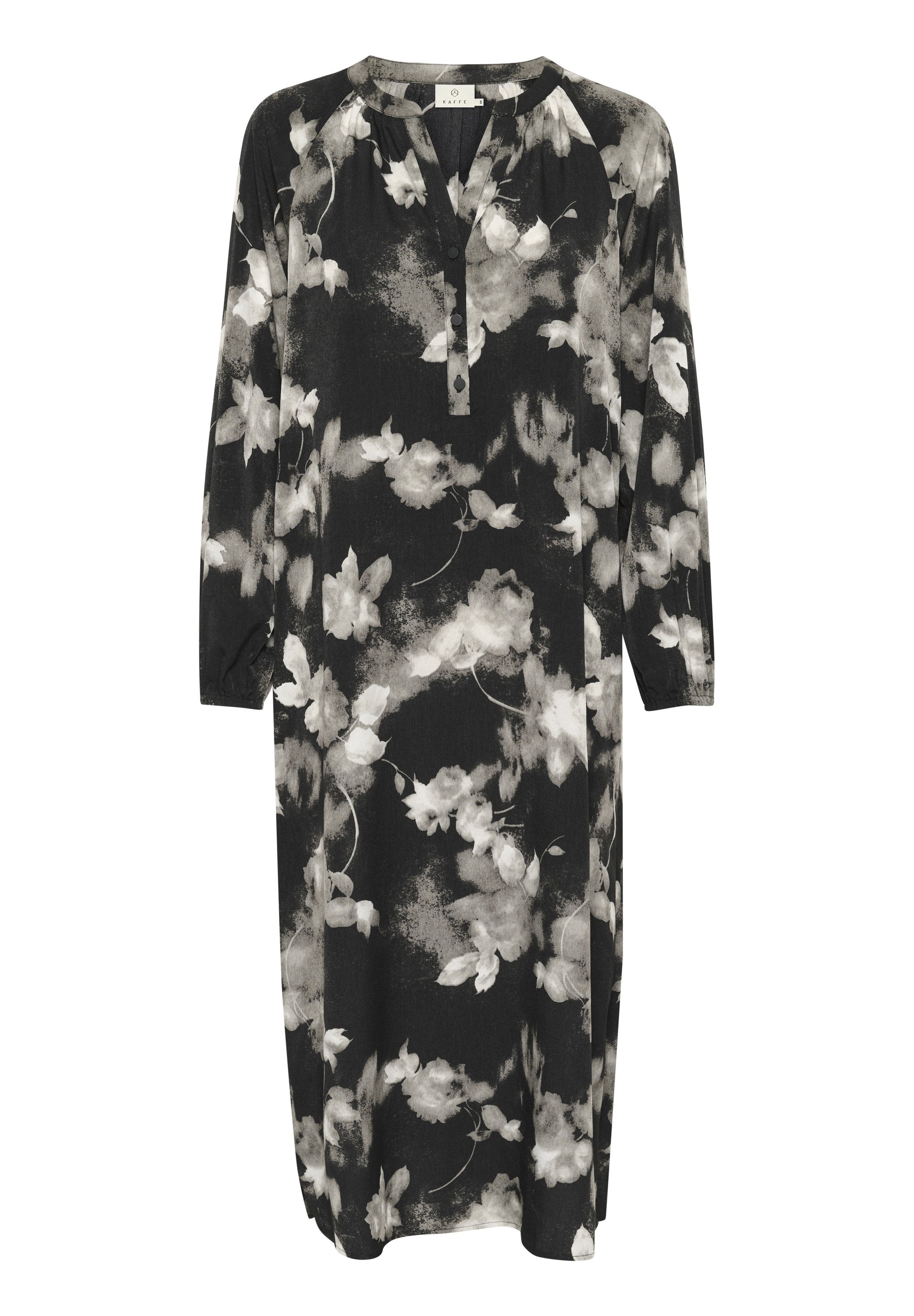 Schwarzes Blumenkleid mit langen Ärmeln, knopfleiste am Ausschnitt und legerem Schnitt. Mit weißen und grauen Blumenmustern auf softem Stoff.