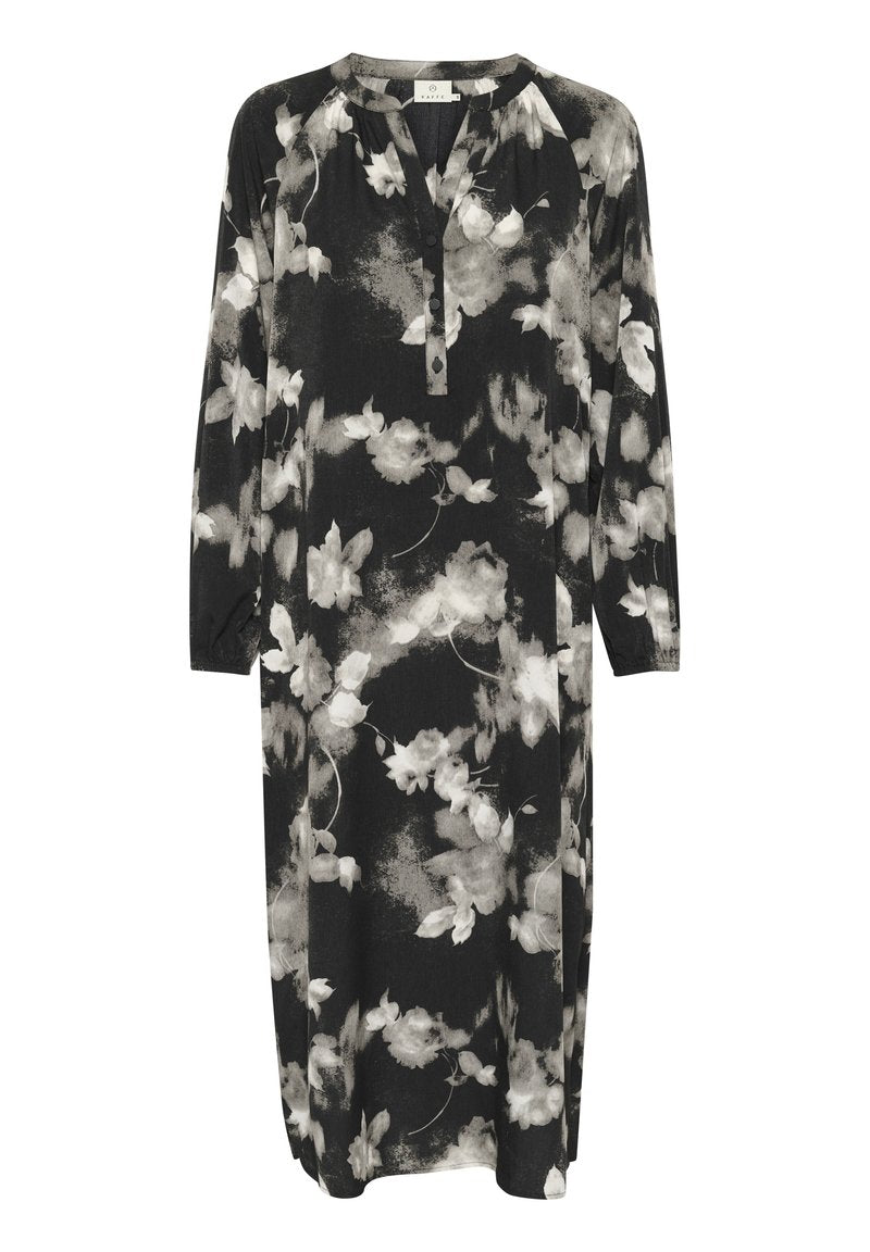 Schwarzes Blumenkleid mit langen Ärmeln, knopfleiste am Ausschnitt und legerem Schnitt. Mit weißen und grauen Blumenmustern auf softem Stoff.