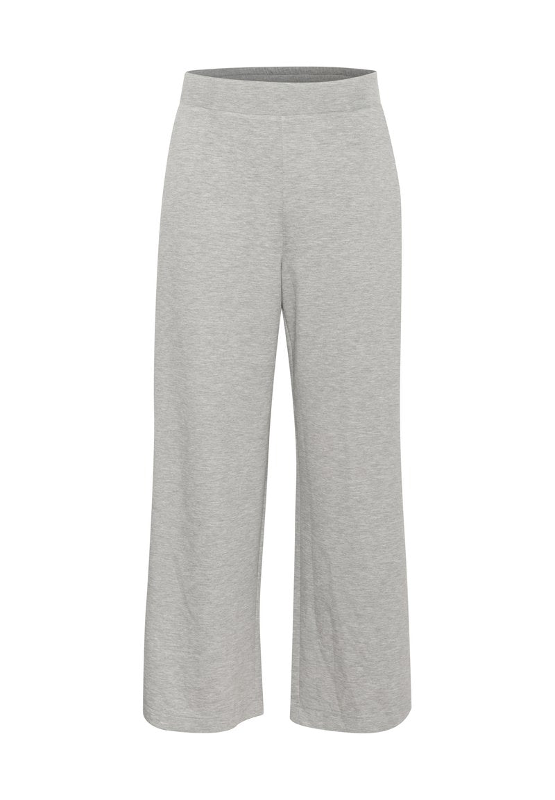 Graue, weit geschnittene Hose aus weichem, dehnbarem Stoff; mit elastischem Bund; glatte Textur ohne sichtbare Muster oder Verzierungen.