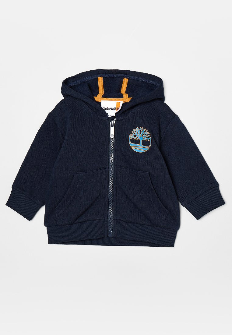 Marineblauer Reißverschluss-Hoodie mit einem Baum-Logo, orangen Akzenten, zwei frontalen Taschen sowie gerippten Bündchen und Saum. Hergestellt aus einem weichen, strukturierten Stoff.