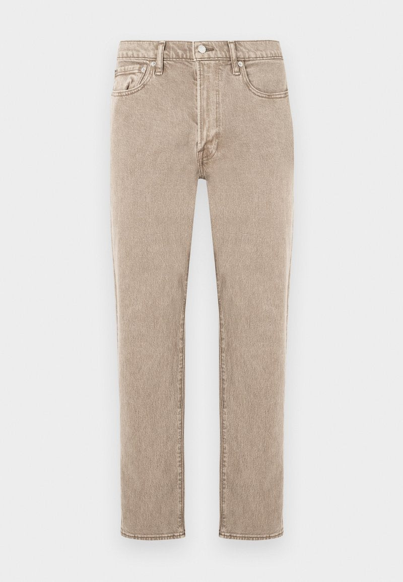 Beige Jeans aus Denim mit geradem Schnitt, ausgestattet mit fünf Taschen, Metallknopfverschluss und dezenter, verwaschener Texture. Klassischer Stil, ungeschmückt.