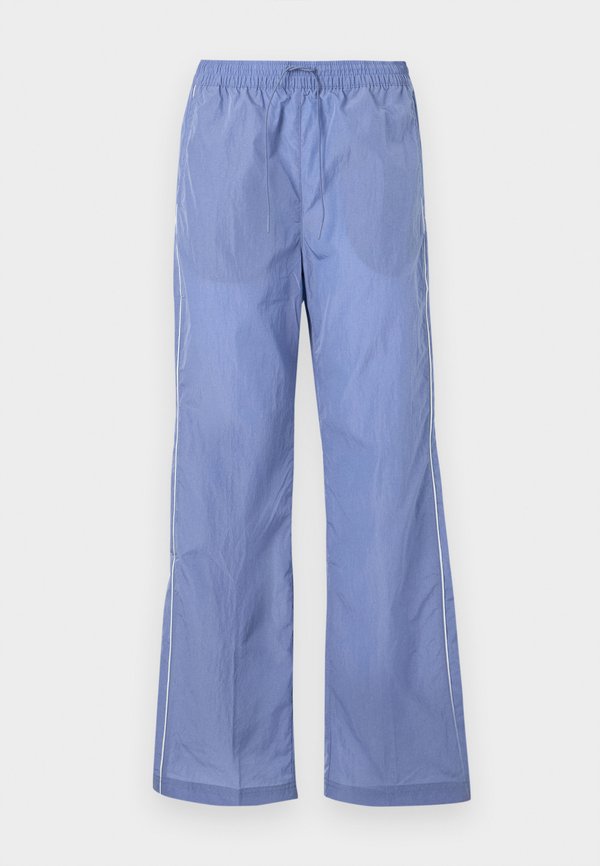 Nike Sportswear PANT - Tracksuit bottoms - world indigo/pure platinum coloured/sail