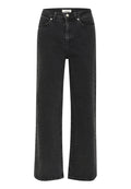 Schwarze weite Jeans aus Denim, mit hoher Taille, Fronttaschen und einem Reißverschluss mit Knopfverschluss. Dezenter Verblassungseffekt auf dem Stoff.