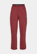 Bordeauxfarbene Sweatpants aus einer weichen Baumwollmischung, mit einem elastischen Bund, geraden Beinen und einem kleinen Logo-Patch an der Seite.