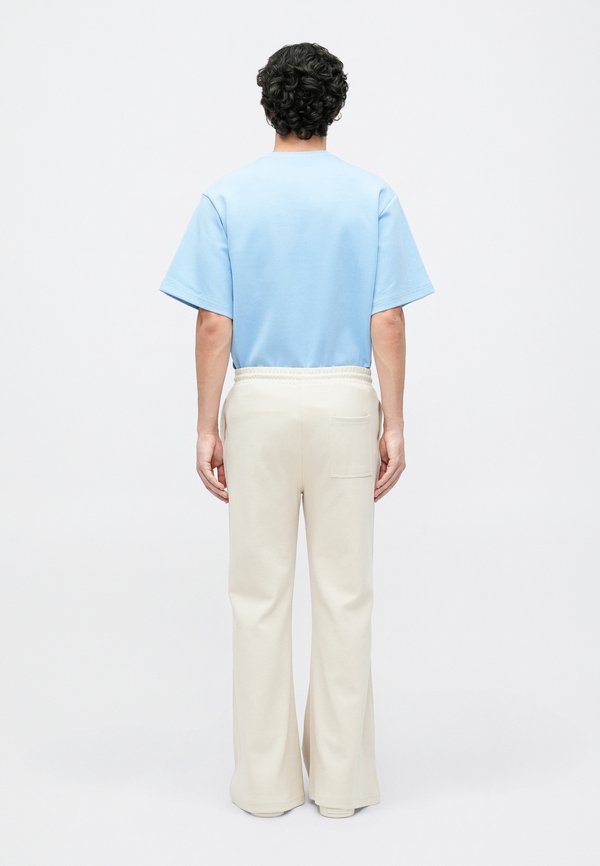 Essential Collective LOOSE FIT TRACK PANT