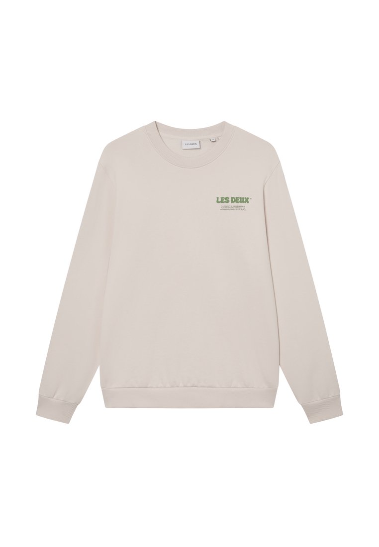 Beiger Sweatshirt aus weichem Stoff, mit Rundhalsausschnitt, gerippten Manschetten und einem grünen Drucklogo auf der Brust. Einfaches, lockeres Design.