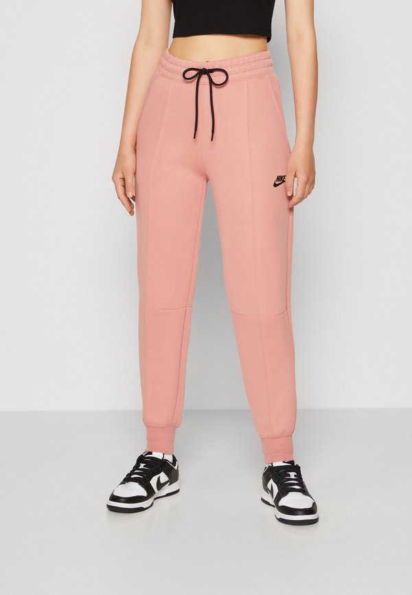 Nike Sportswear Tracksuit bottoms - red stardust/black