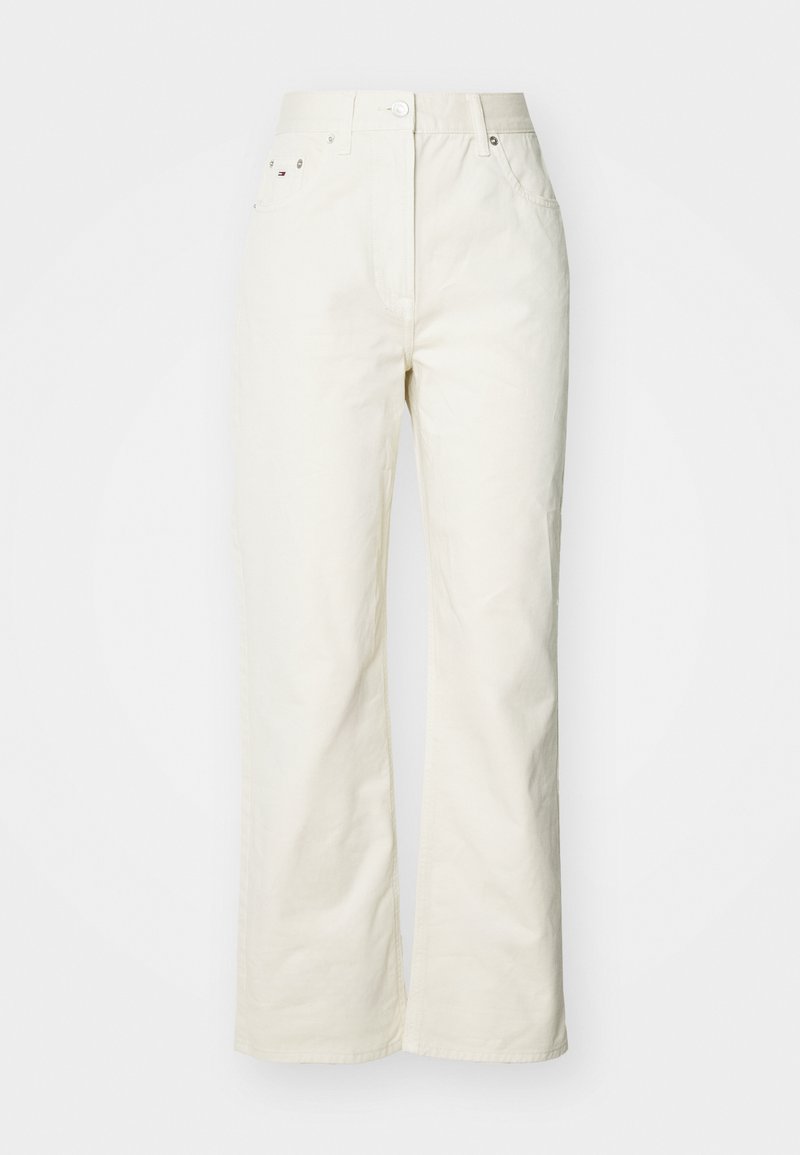 Helle beige weit geschnittene Baumwollhose mit hoher Taille, vorderem Knopfverschluss und zwei seitlichen Taschen mit dezenten Nähdetails.