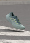 adidas Performance SUPERNOVA SOLUTION 3 - Road running shoes - blue oxide/linen green/sage