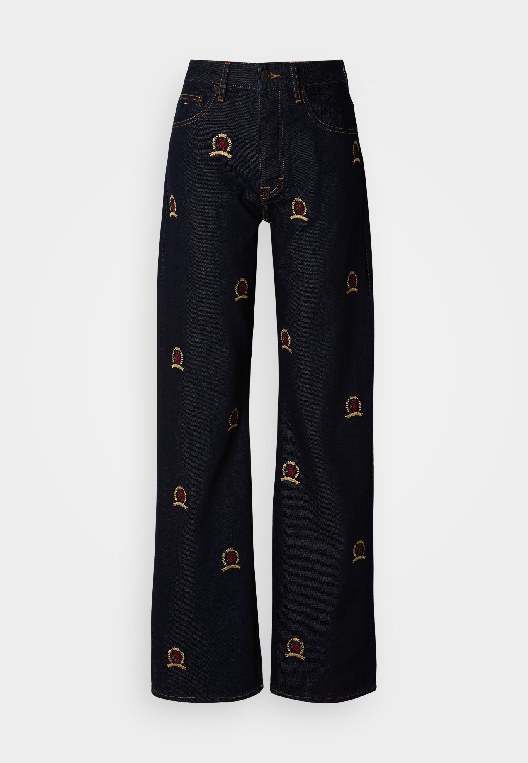 Dunkle Denim-Weite-Bein-Jeans mit mehrfarbig bestickten Kronenmotiven. Klassisches Fünf-Taschen-Design mit kontrastierenden Steppnähten.