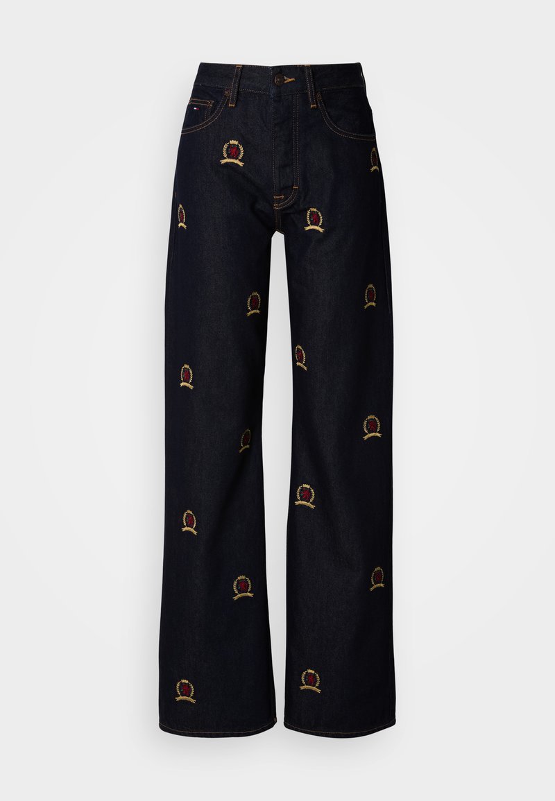 Dunkle Denim-Weite-Bein-Jeans mit mehrfarbig bestickten Kronenmotiven. Klassisches Fünf-Taschen-Design mit kontrastierenden Steppnähten.