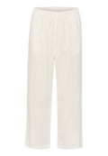 Weiße Leinen-Culotte-Hosen mit einem elastischen Bund, die locker sitzen, gerade Beine haben und keine sichtbaren Muster oder Akzente aufweisen.