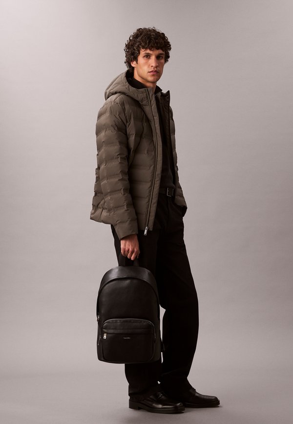 Calvin Klein RAISED ROUND BACKPACK - Rucksack - black
