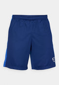 Marinefarbene Sportshorts aus leichtem Material, mit einem blauen Akzentbereich und einem eingestickten Logo am unteren rechten Bein.