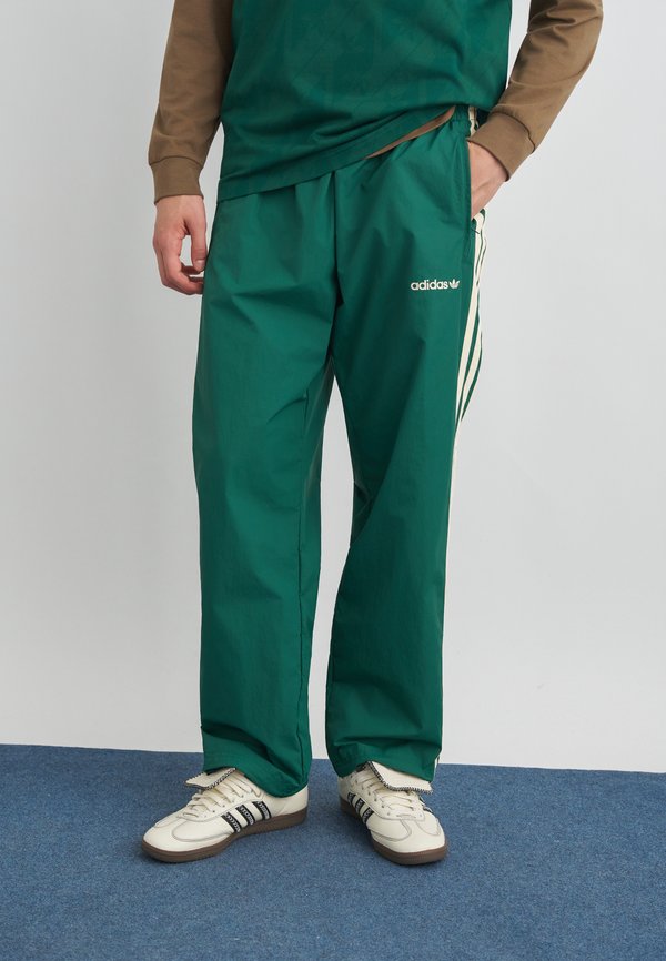 adidas Originals MUC TP - Trousers - collegiate green