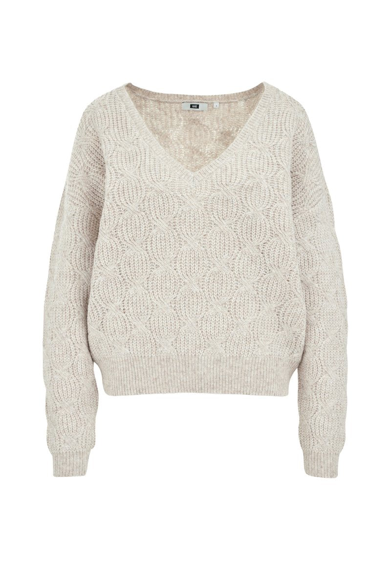 Helle beige gestrickte Pullover mit V-Ausschnitt, der ein strukturiertes Muster aus verwobenen Kreisen sowie gerippte Ärmelbündchen und Saum aufweist.