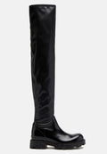 Kniefeste schwarze Gummistiefel mit glänzender Oberfläche, ausgestattet mit einer robusten Sohle und glatter Textur. Elegantes Design mit minimalen Details.