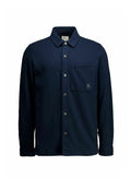 Marineblaue Hemdjacke aus strukturiertem Stoff, mit Brusttasche, abgerundetem Kragen und langen Ärmeln in entspannter Passform.