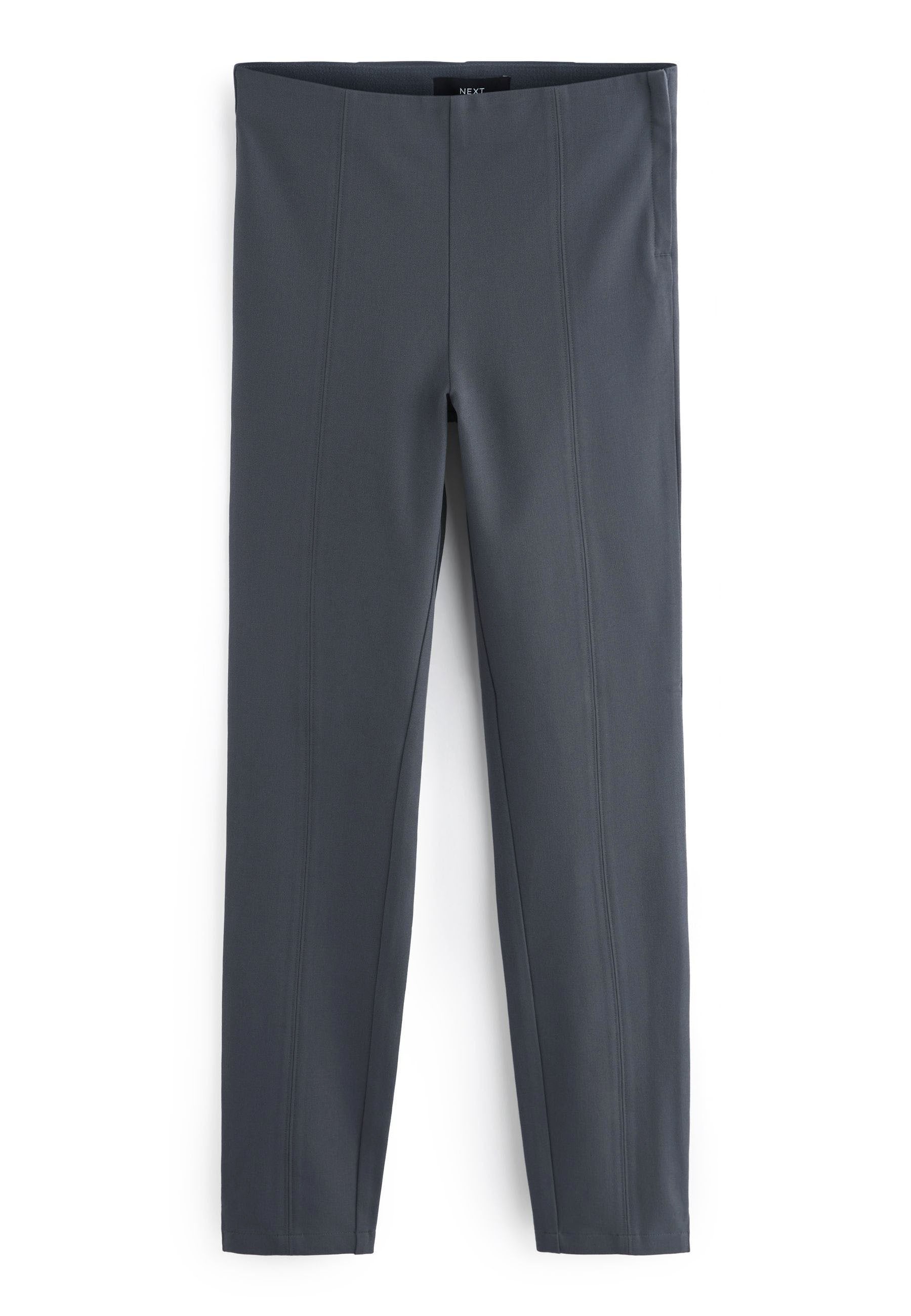 Graue Leggings aus einem glatten, dehnbaren Stoff. Mit vertikalen Nahtdetails und einem hohen Bund, entworfen für eine körperbetonte Silhouette.
