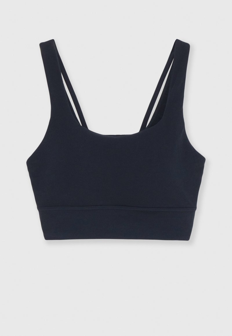 Sport-BH in Marineblau, hergestellt aus weichem Material, mit Rundhalsausschnitt, breiten Trägern und einem elastischen Unterband für zusätzlichen Halt.