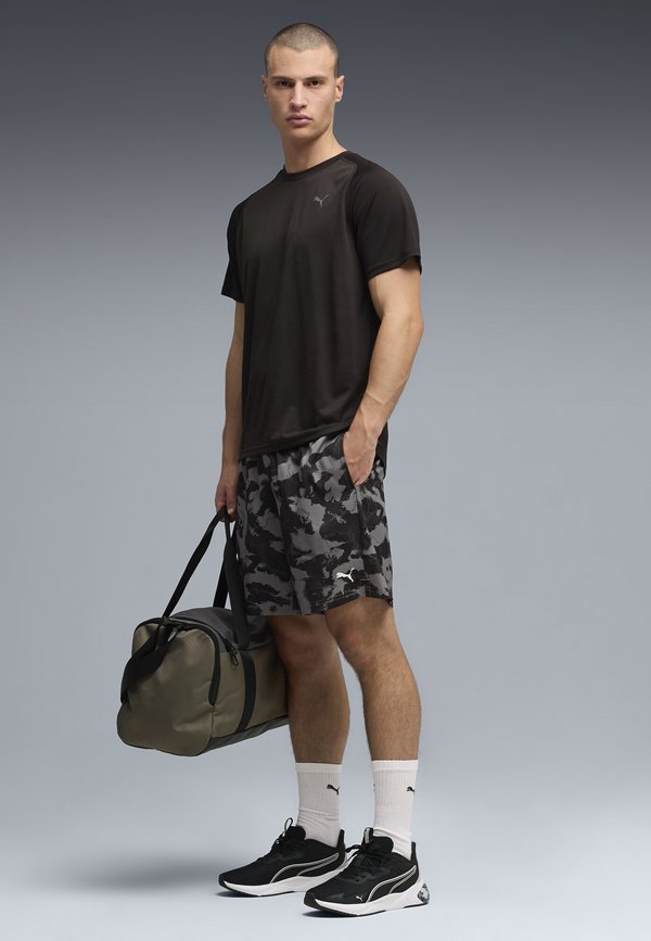 Puma M PWRTRAIN FABRIC MIX TEE - Sports T-shirt - black