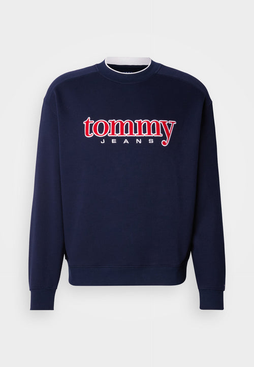 Marineblauer Pullover mit großem rotem und weißem "tommy"-Logo und dem Schriftzug "JEANS", geripptem Rundhalsausschnitt und Bündchen, aus einem weichen Baumwollmischgewebe.